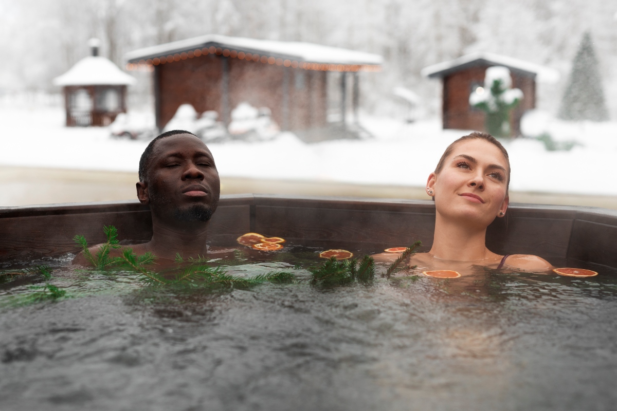 People in a thermal pool, enjoying a spa day. 